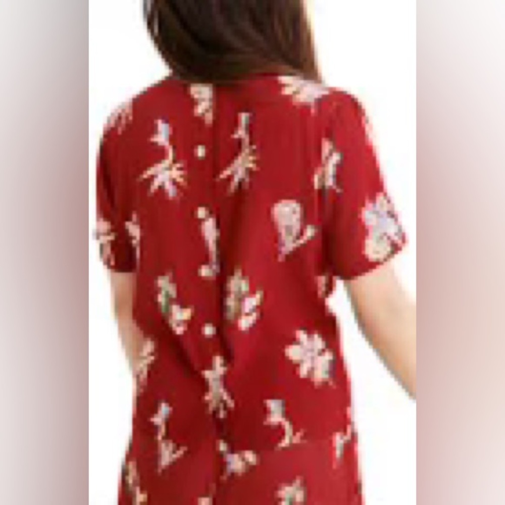 Madewell birds of paradise button back blouse.